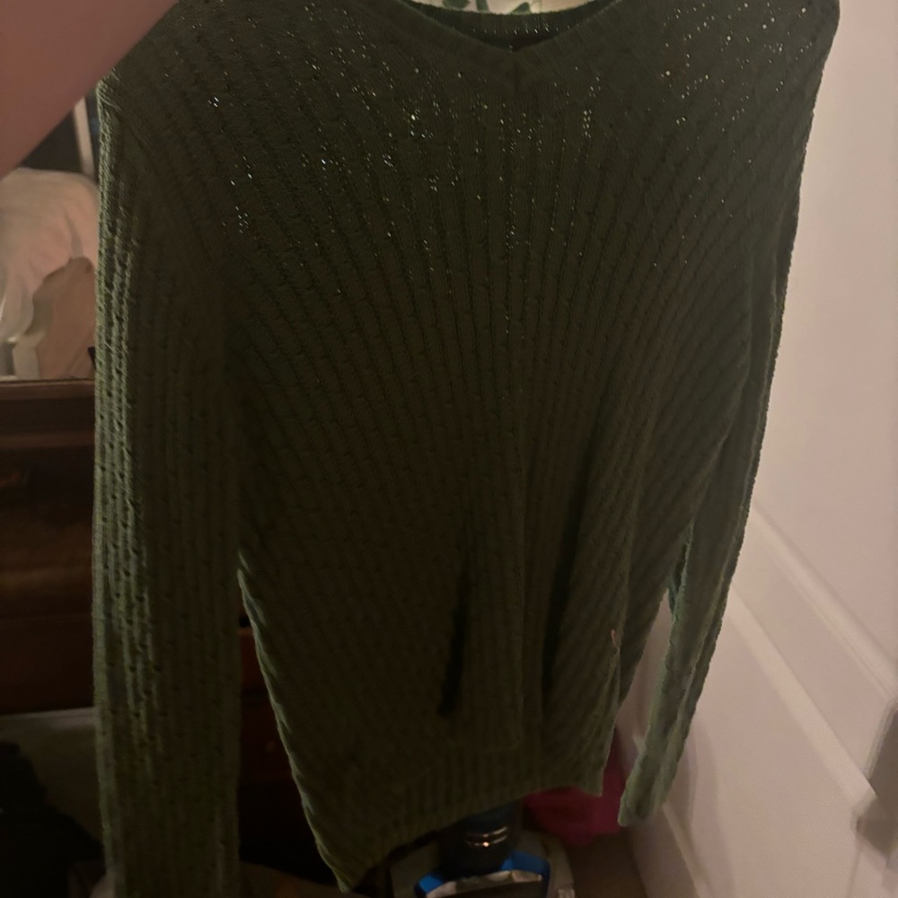 knitted green sweater